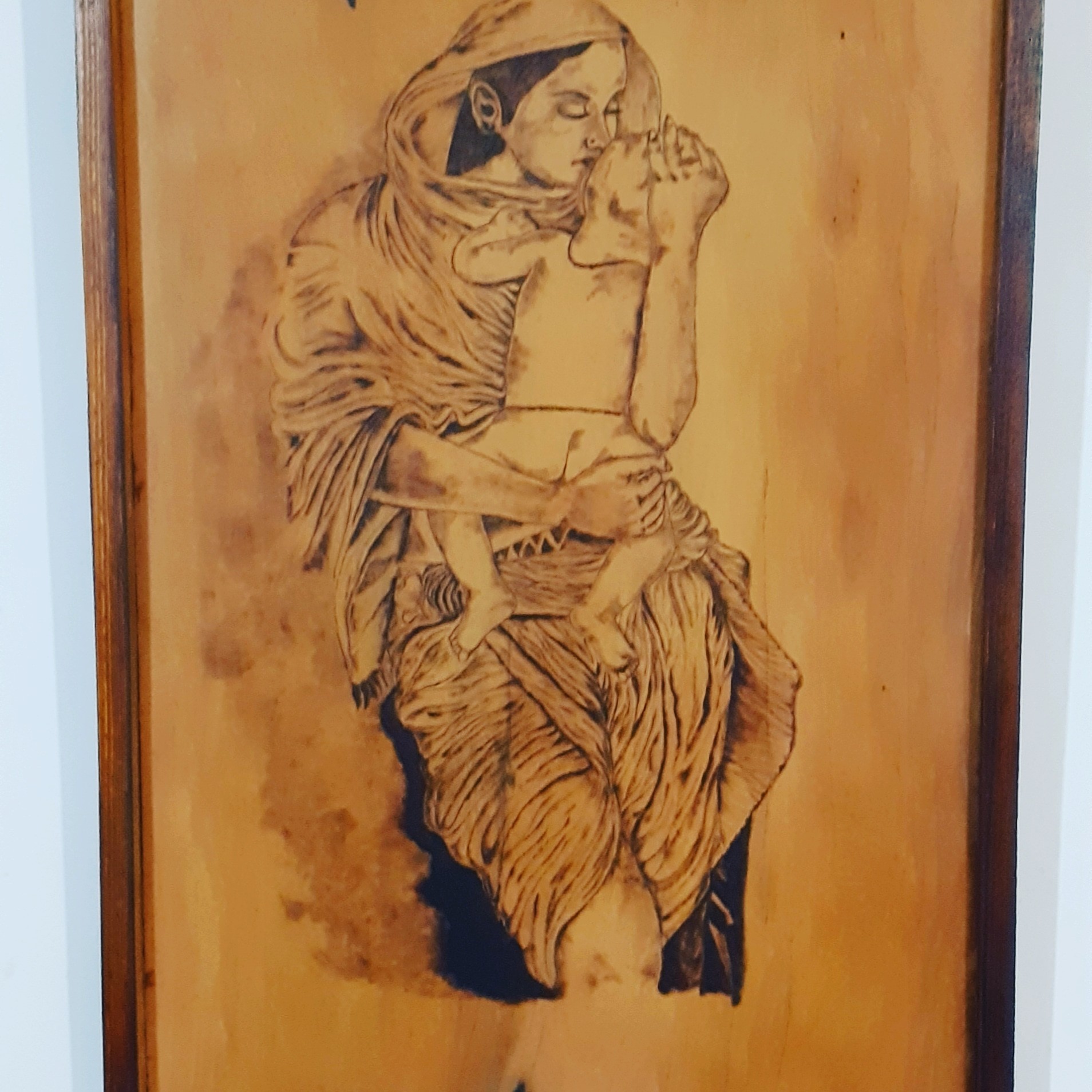 Wood burning art by Yasiru Sachintha