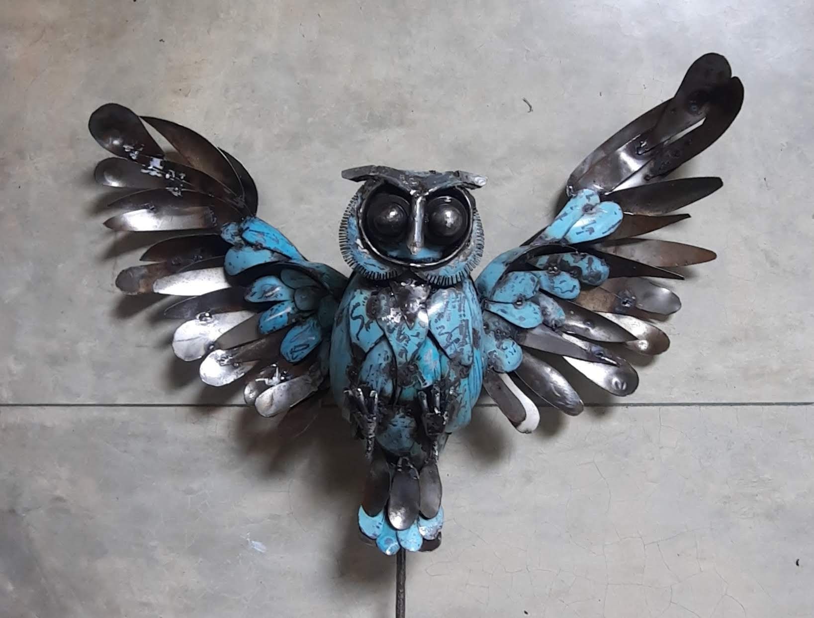 Flying Owl by Dep Thushara