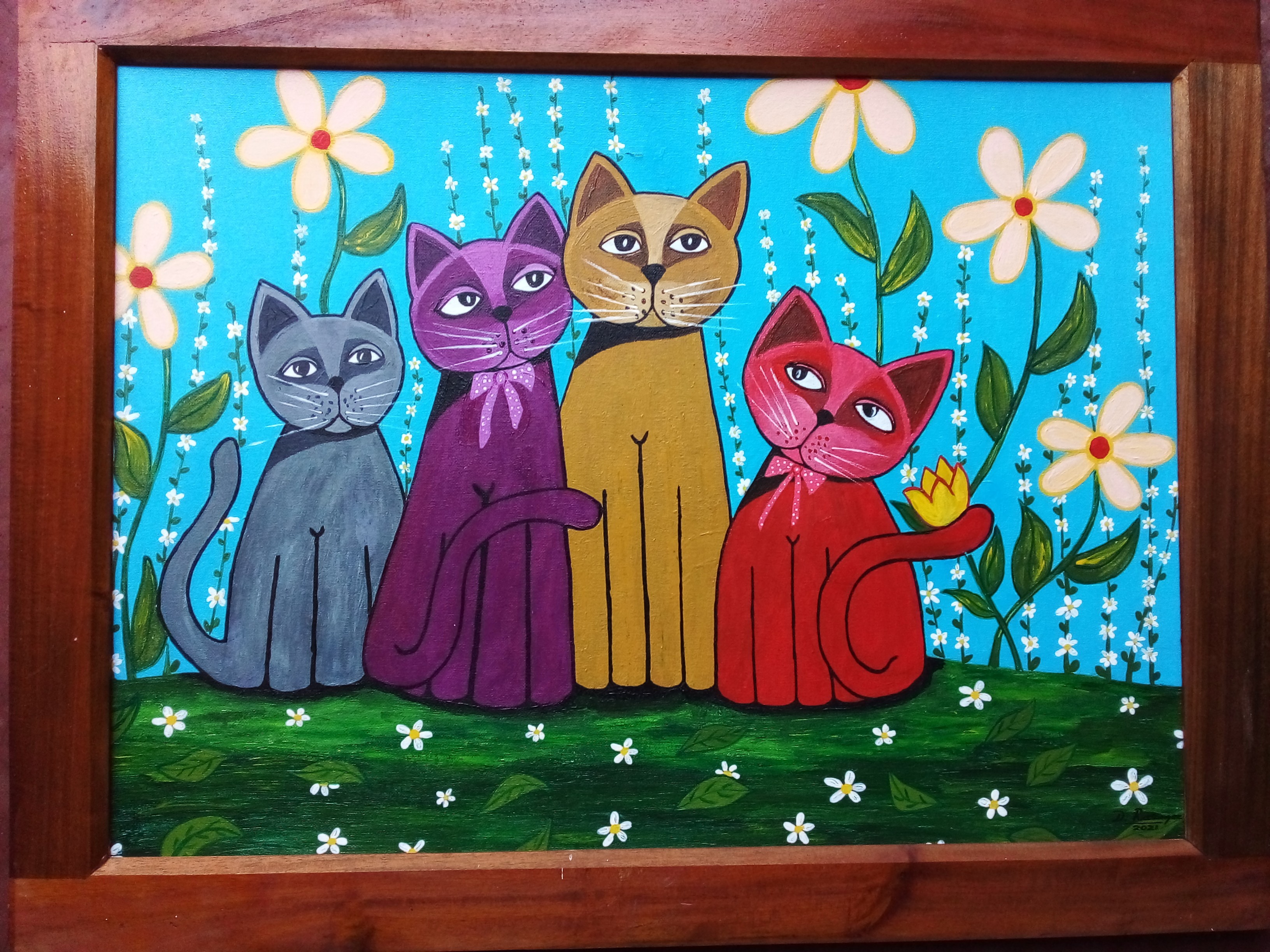 Cat family by Dhamitha Rasangee