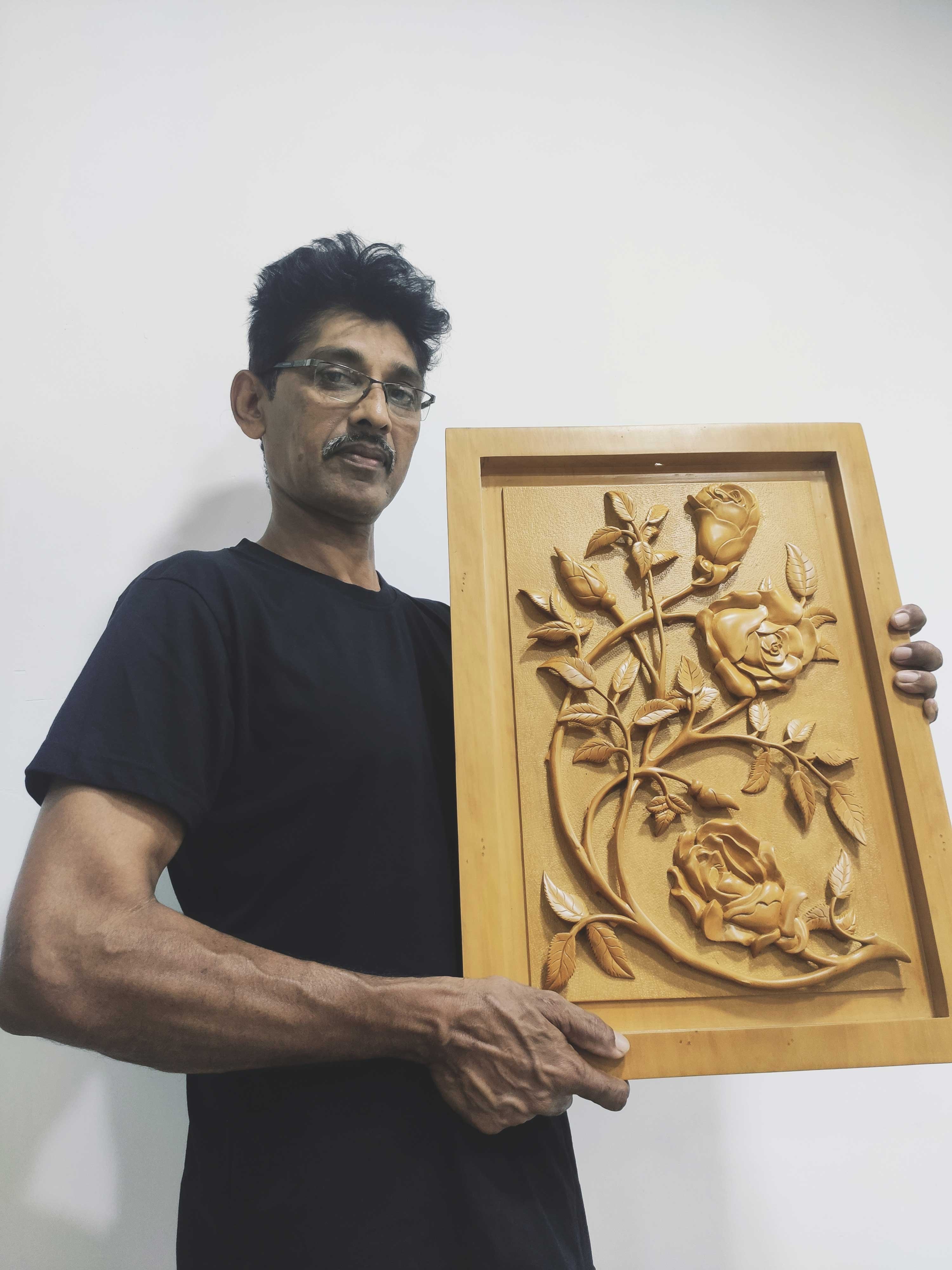 Roses and thorns wood carving by Widalath Arachchilage Jayathilaka