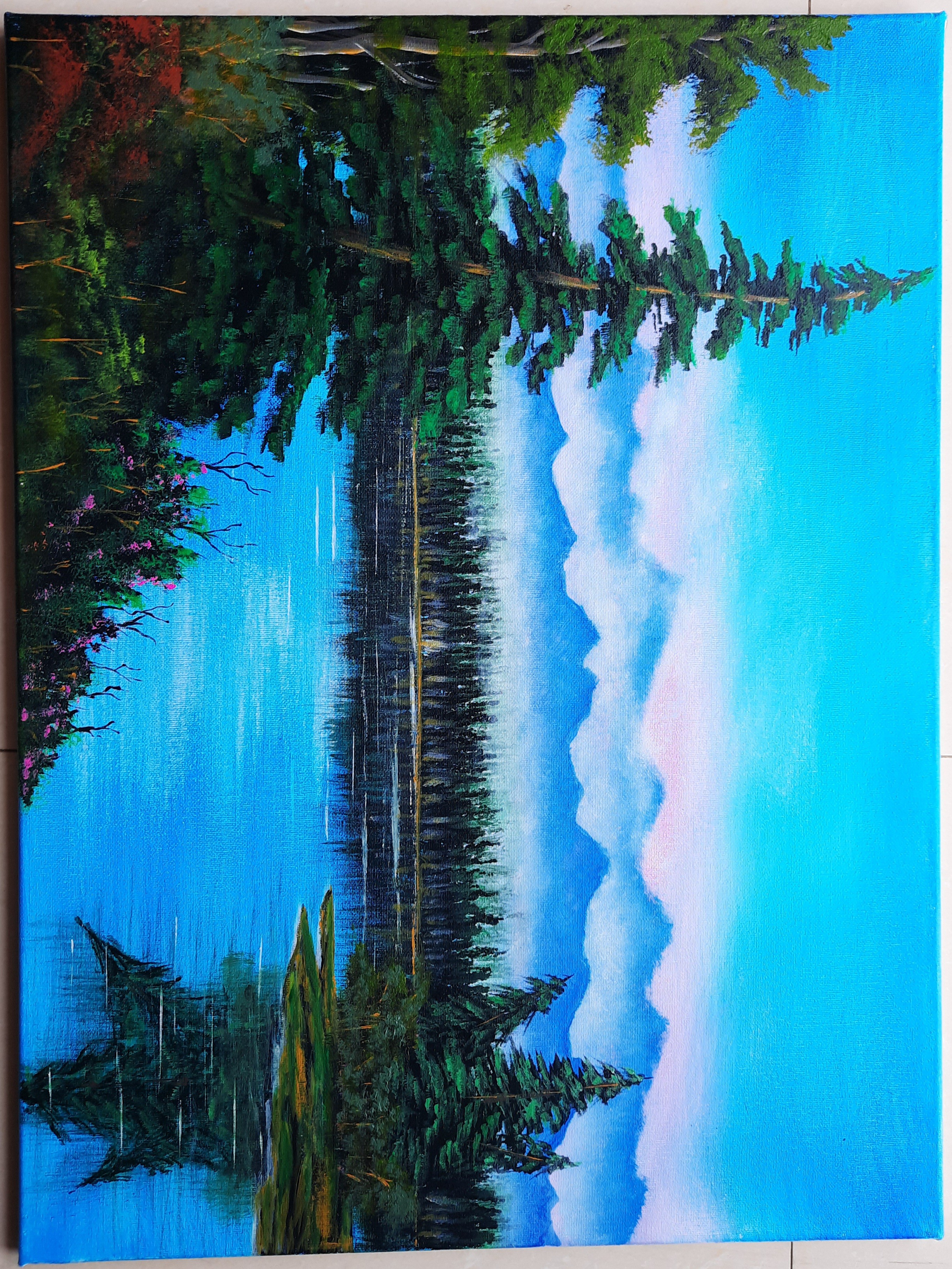 Evergreens overlooking lake by Roshan Fernando