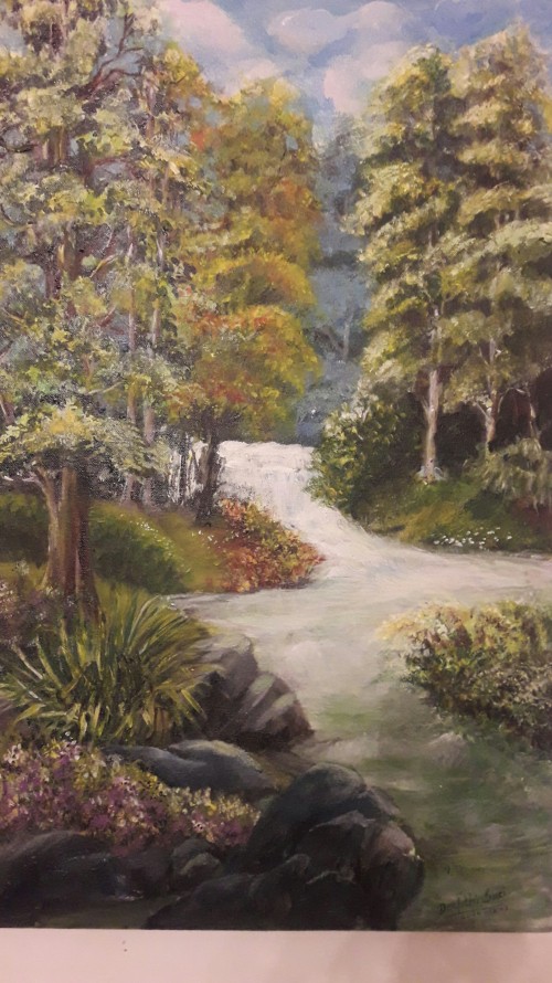 A Park Near A Water Fall.
