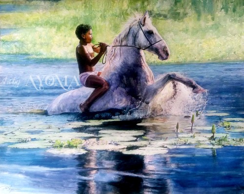 A Boy Riding A Horse